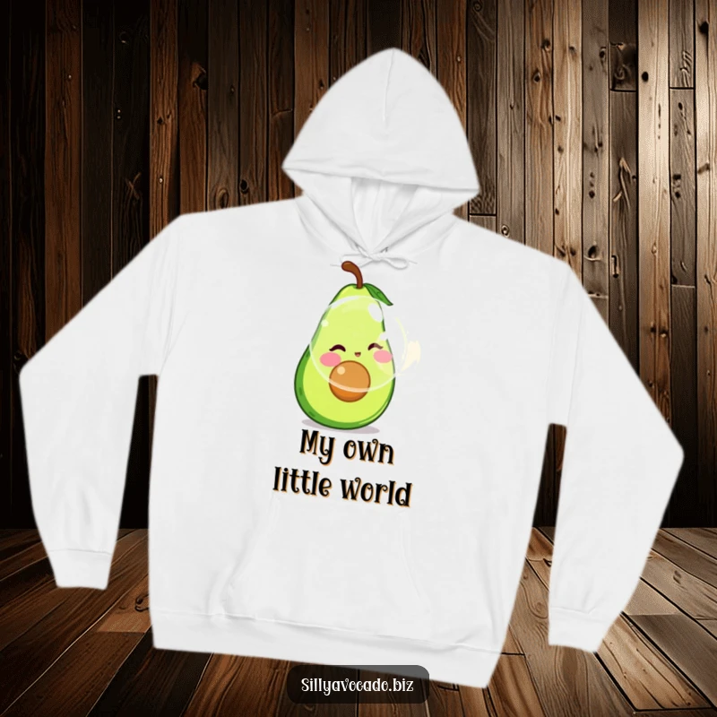 Funny hoodie featuring a happy avocado with rosy cheeks concentrating on blowing a huge translucent bubble.