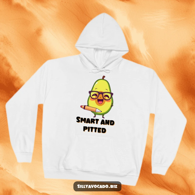 Funny hoodie depicting an avocado wearing tiny spectacles, laughing heartily while holding a large writing pen, looking studious.