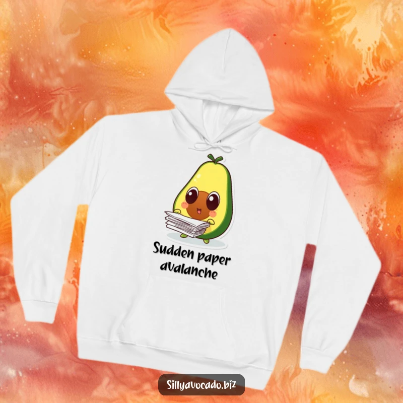 Funny surprised avocado character with wide eyes, papers flying everywhere, on a soft, warm hoodie.