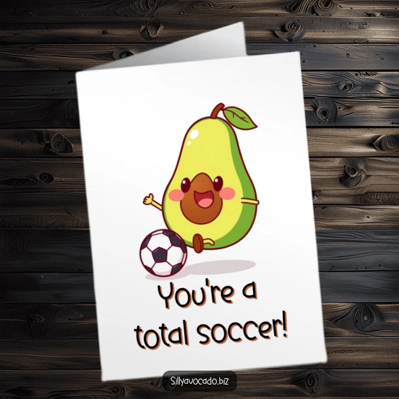 Funny Free Printable Congratulations Card showing a cheerful avocado with tiny legs scoring a soccer goal, celebrating success.